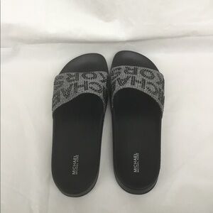 Brand new Michael Kors silver and black bejeweled sandals